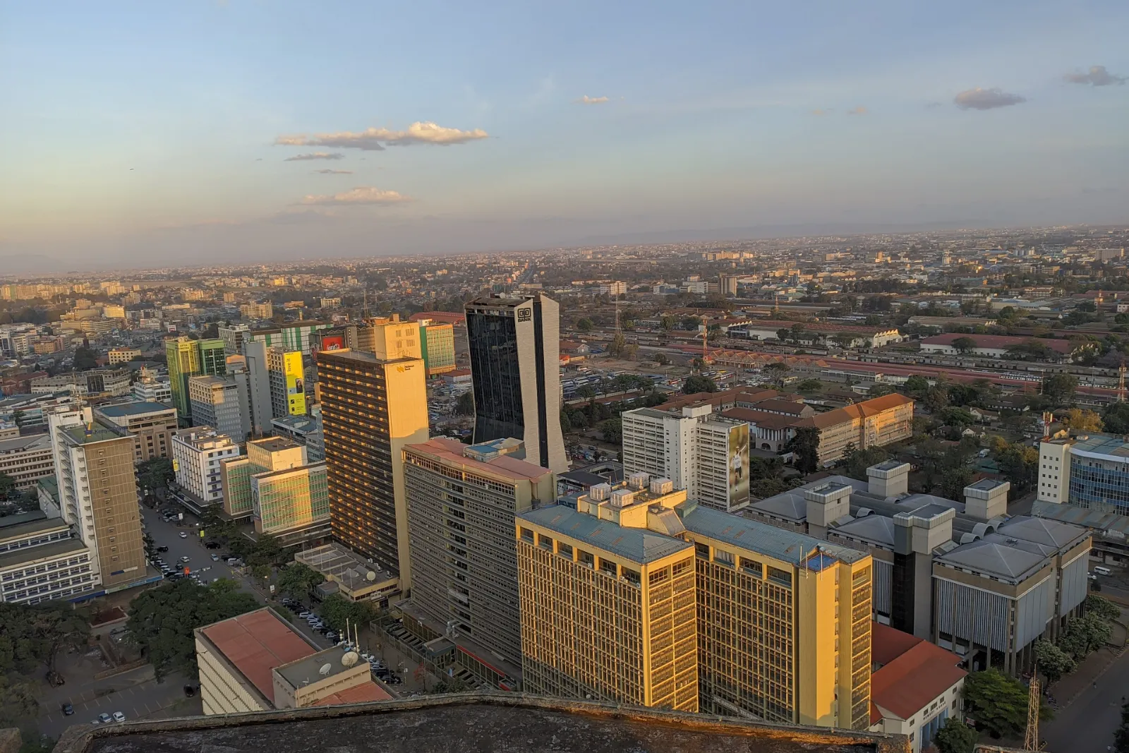 The Nairobi skyline at golden hour, seen from the KICC rooftop
