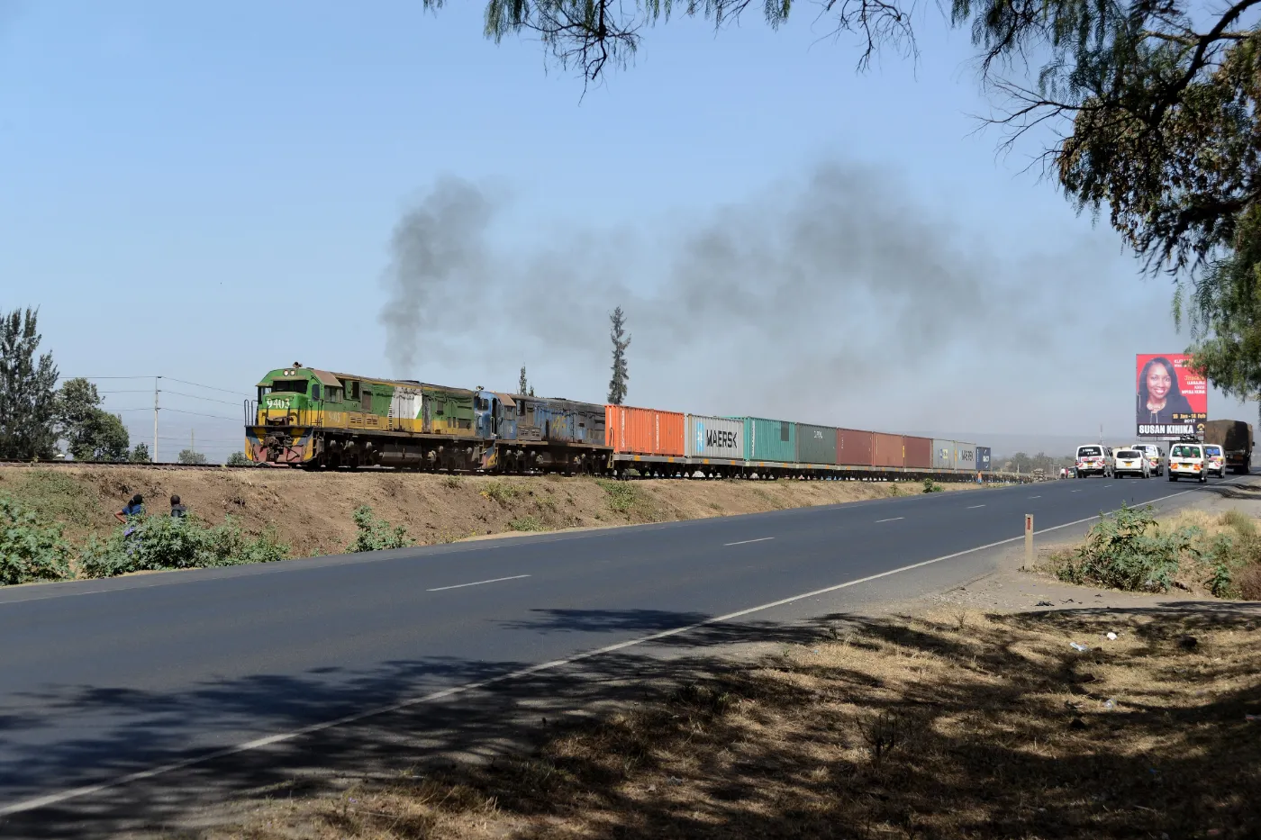 Two diesel locomotives pulling a container freight train near Nakuru, Kenya